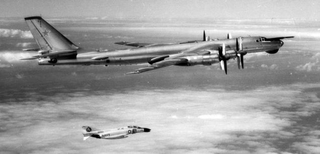 A Tu-95 Bear D escorted by a US Navy McDonnell Douglas F-4B Phantom II over the Mediterranean Sea in 1973 (US Navy)